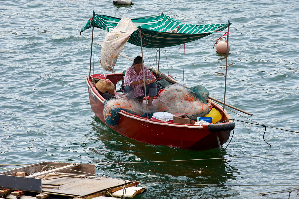 Tanka Fisherwoman mending nets Aberdeen Fishing Village Hong Kong Hong Kong August 2008