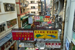 Side street with Chinese advertising signs from the Central to Mid level escalator Hong Kong Hong Kong August 2008
