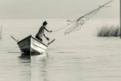 Fisherman casting net on Lake Chapala, Jalisco, Mexico