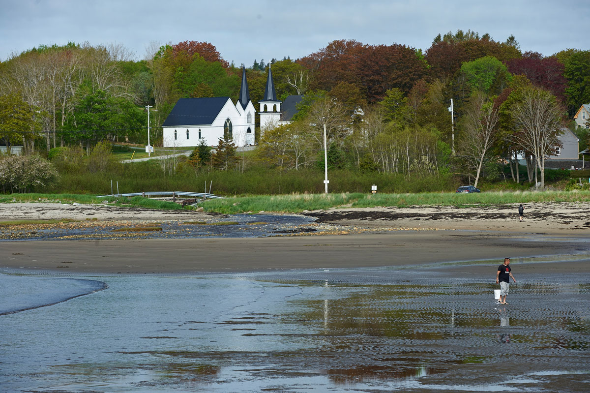 View to St. Marks Church (nearest and Broad Cove United Church from the beach at Broad Cove, Nova Scotia, Canada,