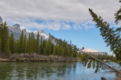 The Old Engine Bridge over the Bow River with Rundle Mountain peak behind, Canmore, Alberta, Canada