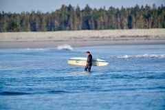 Surfers enjoy the morning waves, Cherry Hill Beach, Nova Scotia, Canada