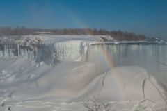 Frozen Niagara falls - Horseshoe Falls with rainbob, from the Canadian side.