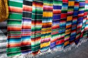 Colourful blankets hanging in street at Ajijic, Jalisco, Mexico.