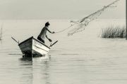 Fisherman casting net on Lake Chapala, Jalisco, Mexico