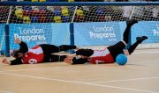 Amy KNEEBONE (CAN) backed up by Nancy MORIN (CAN) during Canada v USA, The London Prepares Goalball Paralympic Test Event - Poland v China, Handball Arena, Olympic Park, London, England December 3, 2011. Canada went on to win 5 - 1 Handball is played by blind or partially sighted athletes wearing
