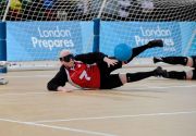 Amy KNEEBONE (CAN) makes a save during Canada v USA, The London Prepares Goalball Paralympic Test Event - Poland v China, Handball Arena, Olympic Park, London, England December 3, 2011. Canada went on to win 5 - 1 Handball is played by blind or partially sighted athletes wearing an eye shade to e