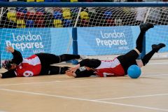 Amy KNEEBONE (CAN) backed up by Nancy MORIN (CAN) during Canada v USA, The London Prepares Goalball Paralympic Test Event - Poland  v China, Handball Arena, Olympic Park,  London, England December 3, 2011. Canada went on to win 5 - 1  Handball is played by blind or partially sighted athletes wearing