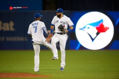 Jun 5, 2015; Toronto, Ontario, CAN; Toronto Blue Jays short stop Jose Reyes (7) and right fielder Jose Bautista (19) reacts after win against Houston Astros at Rogers Centre. Toronto Blue Jays beat Houston Astro 6 - 2. Mandatory Credit: Peter Llewellyn-USA TODAY Sports