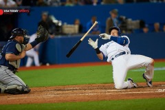 Apr 16, 2015; Toronto, Ontario, CAN; Toronto Blue Jays third baseman Josh Donaldson (20) falls back after being struck by a pitch from Tampa Bay Rays relief pitcher Steve Geltz (not in picture) in the eighth inning at Rogers Centre. Rays beat Blue Jays 4-2, Mandatory Credit: Peter Llewellyn-USA TODAY Sports
