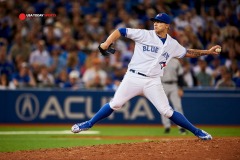 May 4, 2015; Toronto, Ontario, CAN; Toronto Blue Jays relief pitcherBrett Cecil (27) pitches in ninth inning against Toronto Blue Jays at Rogers Centre Blue Jays beat Yankees 3 - 1. Mandatory Credit: Peter Llewellyn-USA TODAY Sports