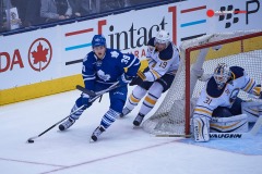 March 19, 2016:  Toronto Maple Leafs Center William Nylander (39) [10756] skates around the goal as Buffalo Sabres Left Wing Cal O'Reilly (19) [5329] defends and Goalie Chad Johnson (31) [5851] tends goalin the first period of game between the Buffalo Sabres and the Toronto Maple Leafs at the Air Canada Centre in Toronto, ON, Canada. (Photo by Peter Llewellyn/ Icon Sportswire)