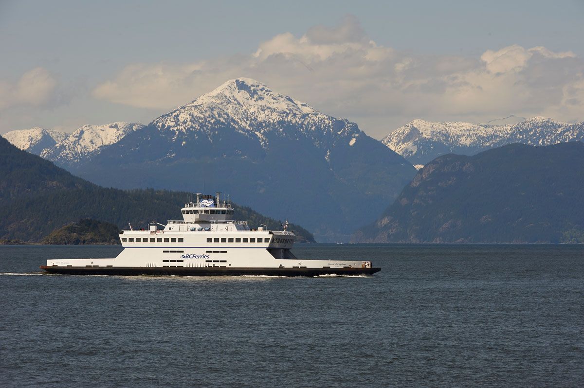 BC Ferries Queen of Capilano with Sunshine Coast Mountains behind Horseshoe Bay Vancouver British Columbia Canada