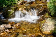 Small waterfall in a stream flowing from Taylor Lake, Banff National Park, Alberta, Canada,