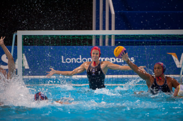 London, England, 05-05-12. Goalkeeper Elizabeth ARMSTRONG (USA) assisted by Brenda VILLA (USA) in the VIsa Water Polo Invitational. Part of the London Prepares Olympic preparations.