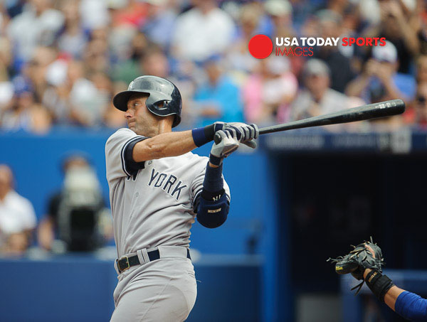 Aug 31, 2014; Toronto, Ontario, CAN; New York Yankees designated hitter Derek Jeter (2) hits a single in first inning against Toronto Blue Jays Rogers Centre. Mandatory Credit: Peter Llewellyn-USA TODAY Sports
